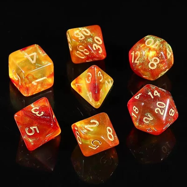 In-stock orange and yellow flame glitter acrylic dice with gold numbers