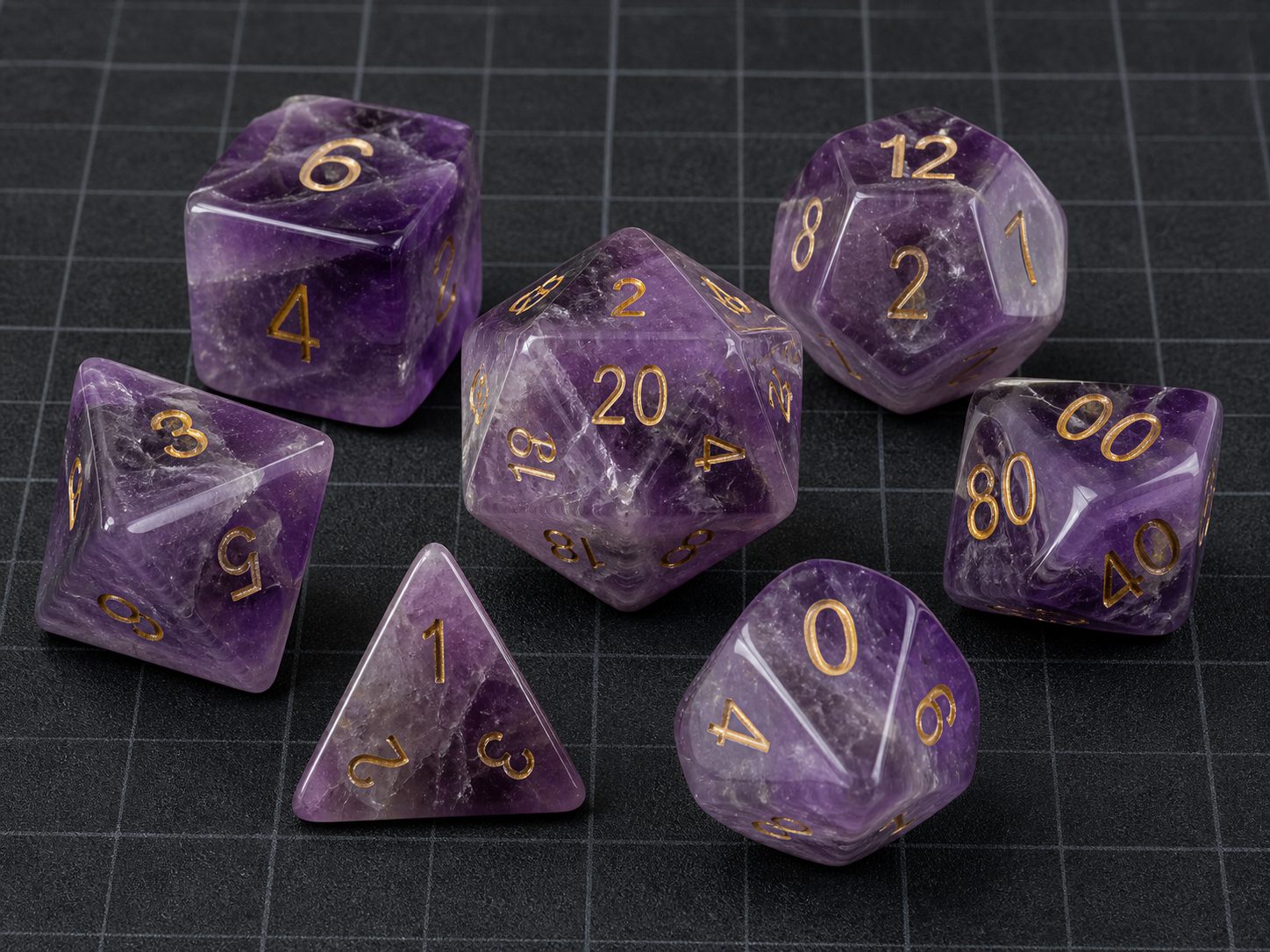 Natural purple amethyst gemstone polyhedral dice with gold numbers