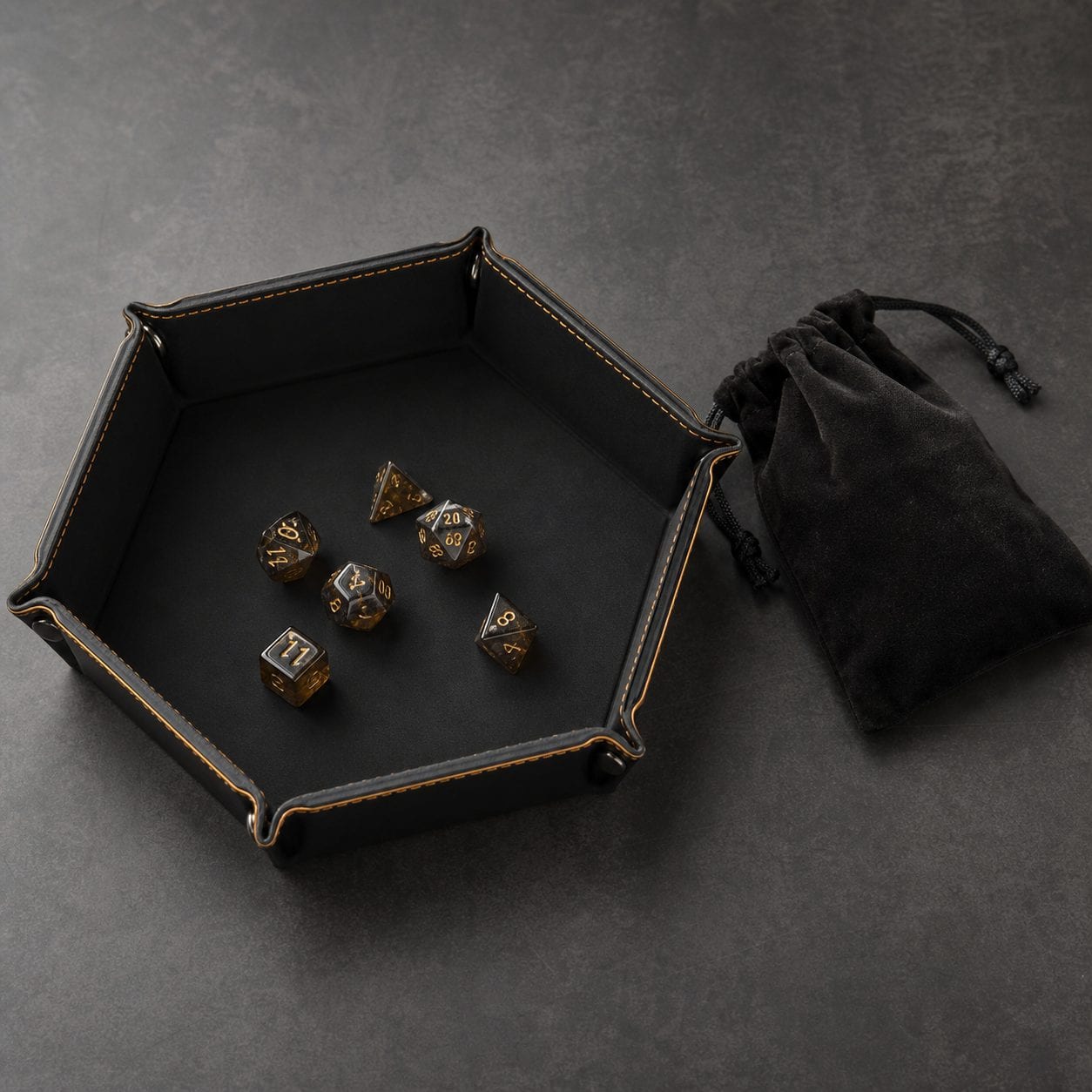 A dice tray and drawstring bag accessory set for polyhedral dice