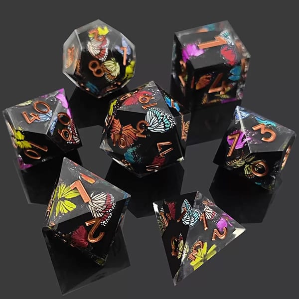 In-stock black sharp-edge resin dice with colourful butterfly wings and copper numbers