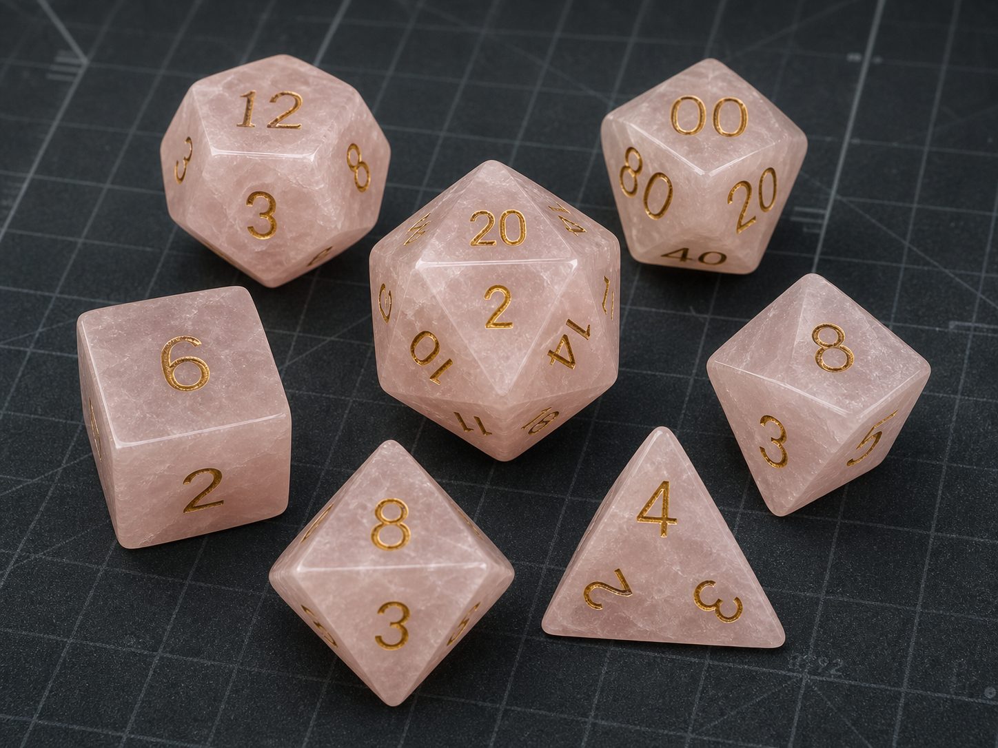 Natural pale pink rose quartz gemstone polyhedral dice with gold numbers